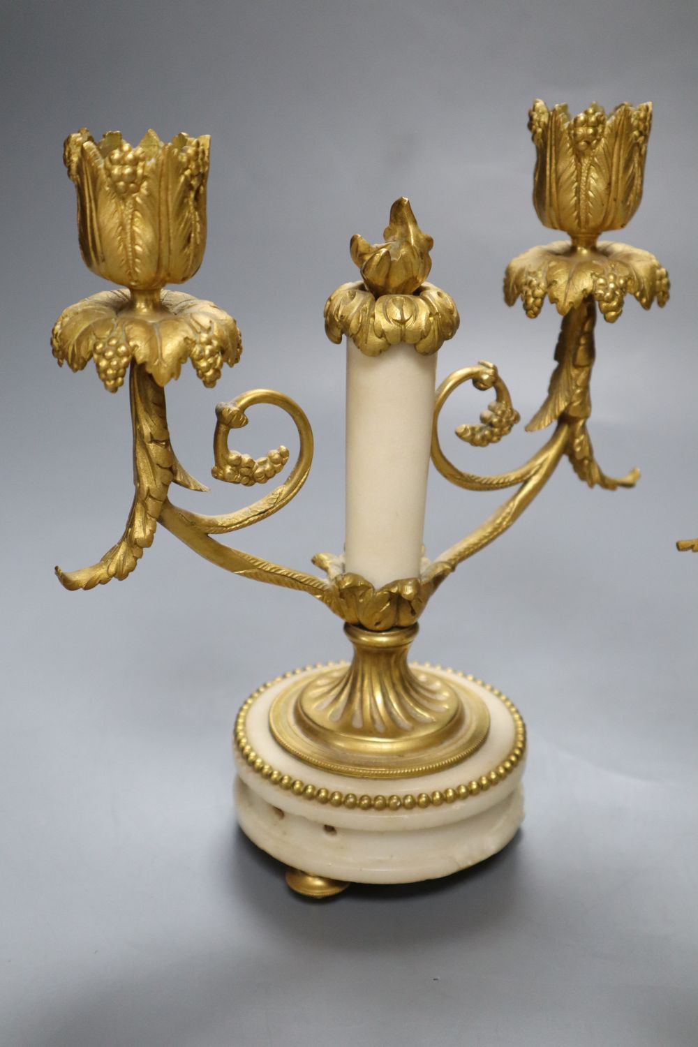 A pair of 19th century ormolu and alabaster candelabra, height 19cm